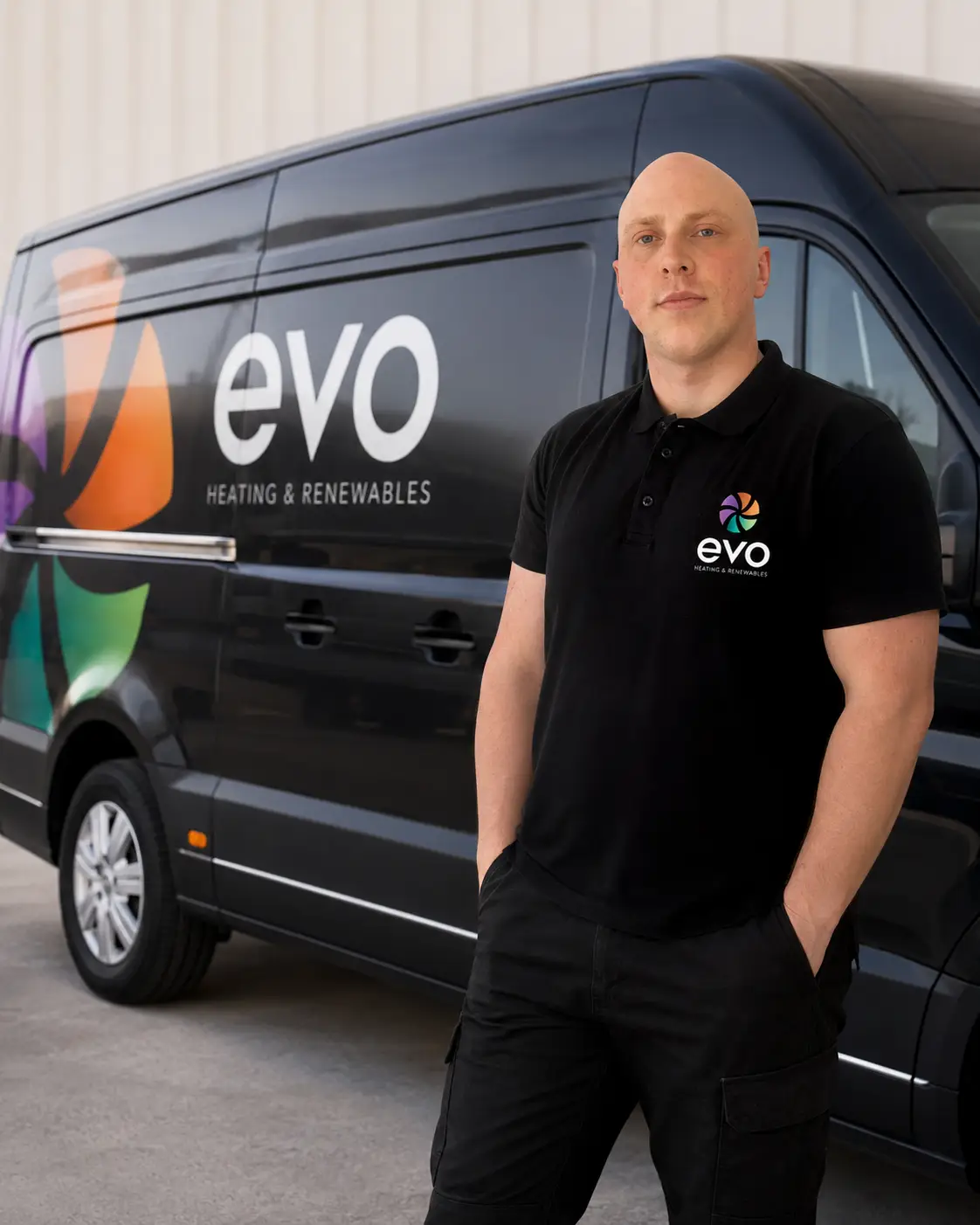 Piotrek the installers from EVO next to the van