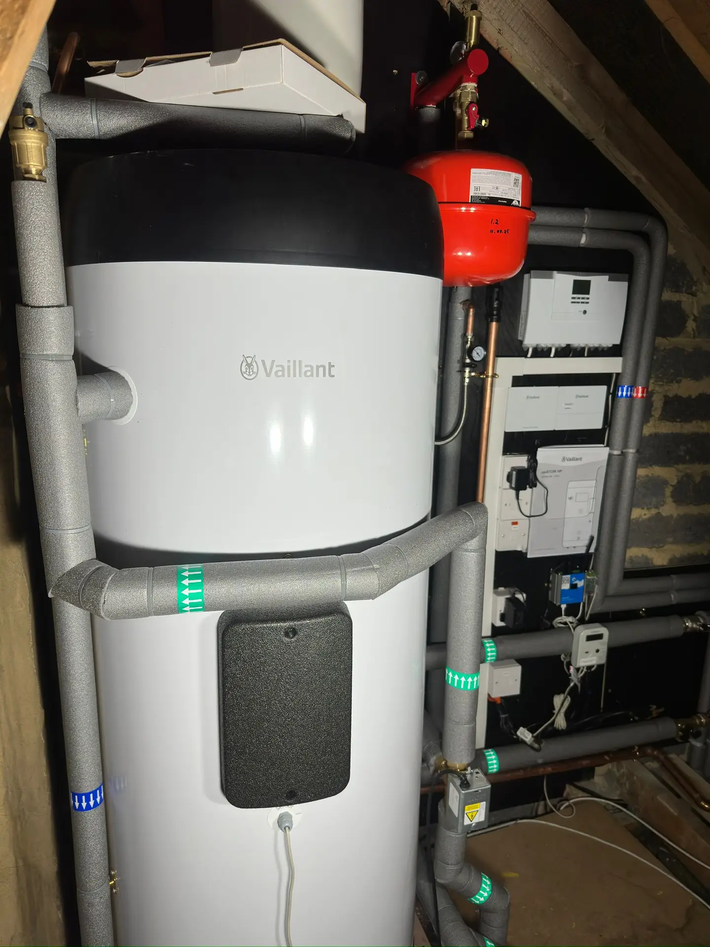 Hot water cylinder and Bespoke Low Temperature Heating Design in Epsom